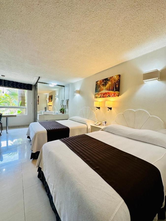 Hotel Plaza Caribe Cancún Eksteriør bilde